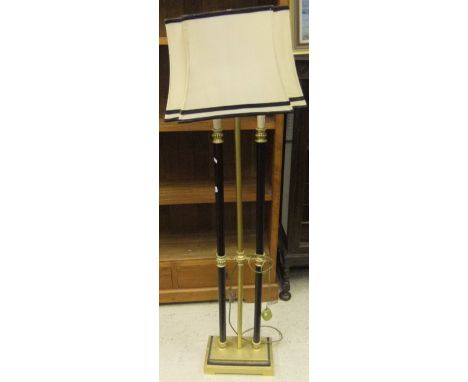A modern standard lamp in the 19th Century taste, the centre column flanked by two faux candle stands