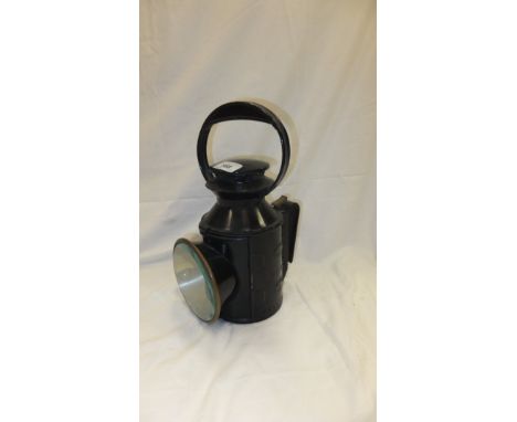 A black British Rail (Midlands) railway lamp bearing initials "BR (M)"