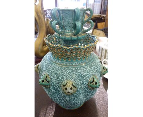 A Zsolnay turquoise "shriveled" vase, some restoration to knops and handles, 29cm