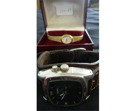 A gents Fossil watch along with a ladies Rotary watch