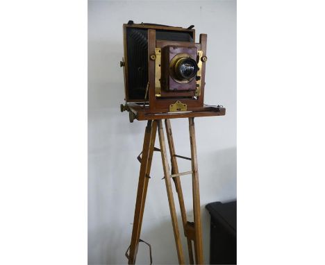 A Victorian half plate camera on tripod