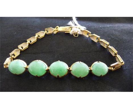 A jade bracelet on gold ( marked 835)- total weight 10g