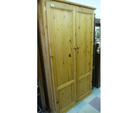 A double door pine wardrobe