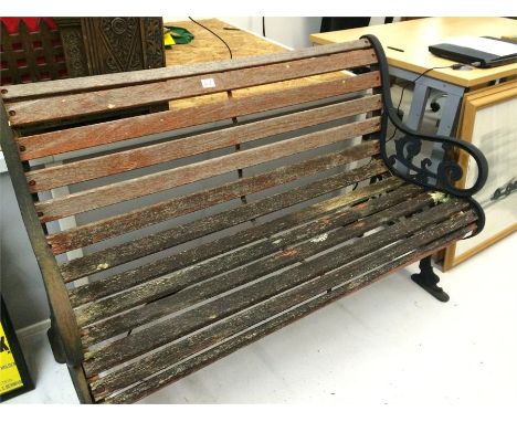 A garden bench with cast iron sides