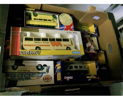 A collection of boxed Corgi, Dinky and Solido cars and buses etc.