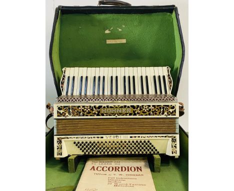 A vintage hard cased Hohner Verdi III piano accordion. 60cms wide x 49cms deep x 26cms high (case size).Estimate £20-40.