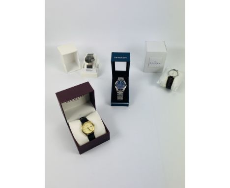 A collection of four boxed fashion watches to include Sekonda, Ingersoll, Skagen and Accurist. Estimate £20-40.