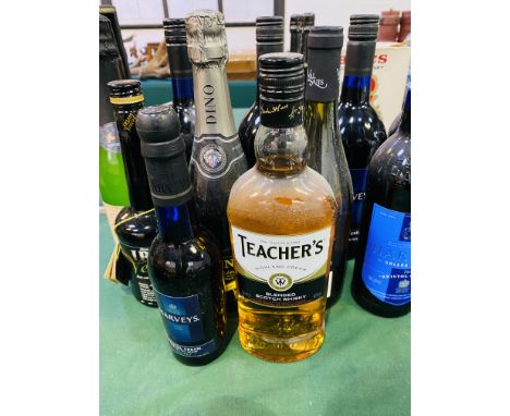Four one litre bottle of Harvey Bristol Cream; a 70cl bottle of Teachers blended Scotch Whisky; together with five other bott
