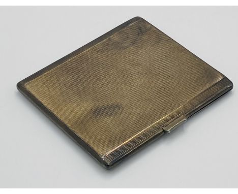 Silver engine turned cigarette case, 131g, Birmingham 1932. Estimate £70-100.