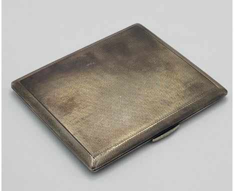 A silver engine turned cigarette case, 130g, London 1947. Estimate £70-100.