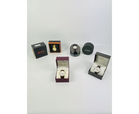 A collection of four boxed fashion watches to include Citizen, Mido, Rotary and Accurist. Estimate £20-40.