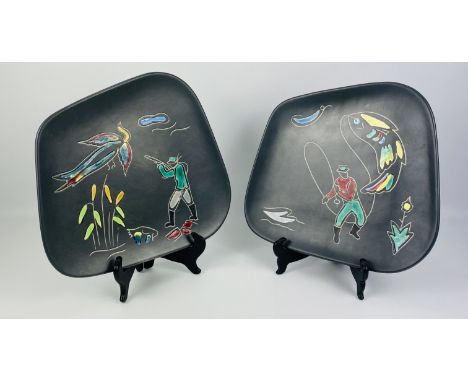 A pair of West German mid century ceramic plates depicting game shooting and fishing scenes, by Georg Schneider Zeller Kerami