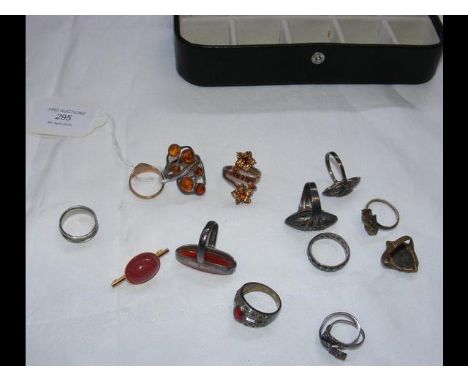 A gold signet ring, together with other costume rings 