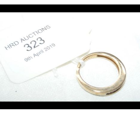 A 9ct gold channel set diamond ring - Size M