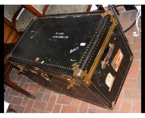 An Overland studded travelling trunk with vintage Cunard label to side - width 92cm  