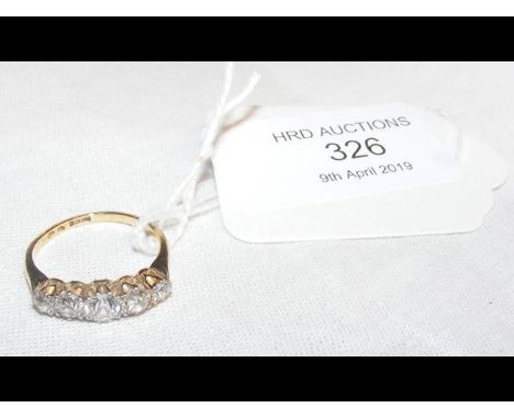 A lady's five stone diamond ring in gold setting 