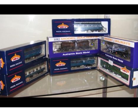 A boxed Bachmann carriage, together with six others 