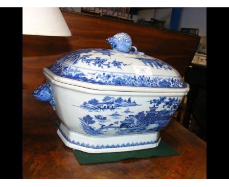 A ceramic tureen and cover decorated in blue and white oriental style CONDITION REPORTcouple of firing cracks but otherwise o