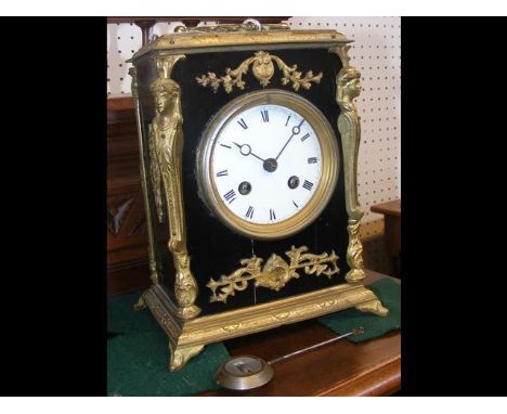 A 19th century gilt mounted French mantel clock - 23cm high CONDITION REPORT£25/30 UK POSTAGE