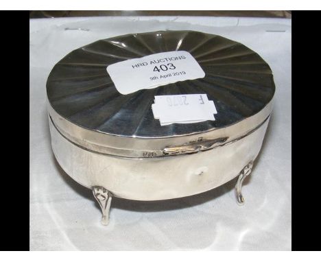 An oval silver ring box 