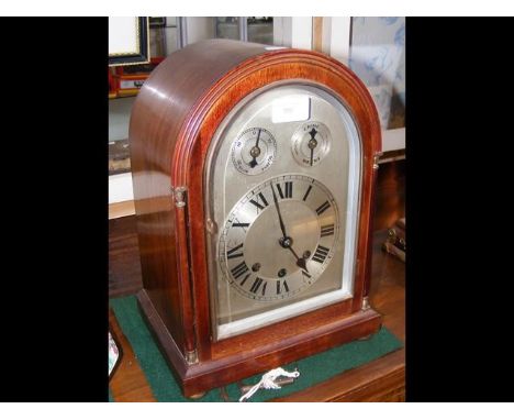Chiming mantel clock in mahogany case - 34cm high 