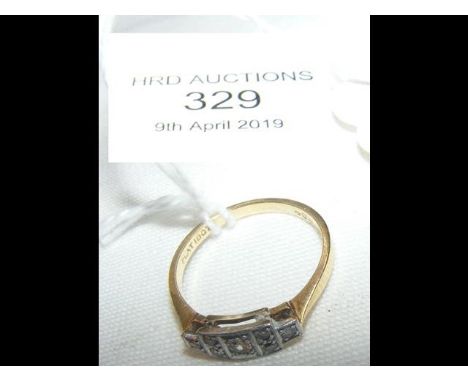 A diamond ring in gold setting 