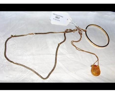 A gold necklace, pendant, bangle, etc. 