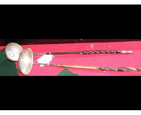 A silver toddy ladle with horn handle and one other CONDITION REPORTNo hallmarks. Damage to both ladles