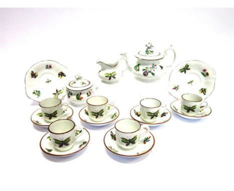 A LATE 19TH CENTURY TEA SET Comprising of six cups & saucers, cream jug, covered sugar bowl (both with stands) and a teapot. 