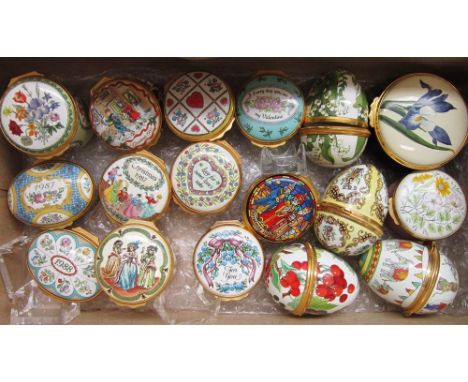 ELEVEN HALCYON DAYS ENAMEL BOXES including 'The Metropolitan Opera', 1984; together with four enamel Easter Eggs; and two ena