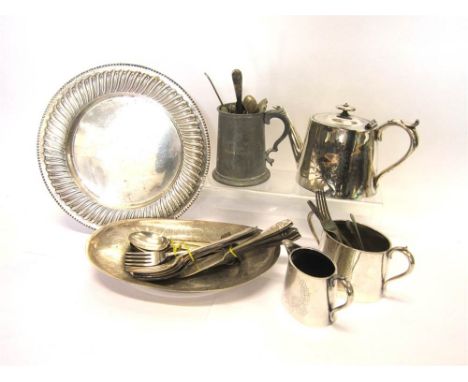 A THREE PIECE LATE VICTORIAN PLATED TEA SERVICE a bread board dish, lacking the board; an oval dish; a pewter mug; and assort