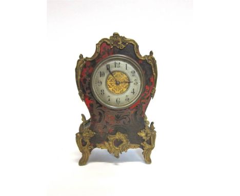 A 19TH CENTURY FRENCH BOULLE MARQUETRY MANTEL CLOCK the circular silvered metal chapter ring with black Arabic numerals, the 