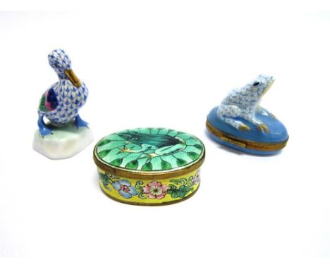 A HEREND FIGURE OF A DUCK 6.5cm high; an oval Limoges box with frog surmount; and an oval enamel 'frog' box and cover, (3)
