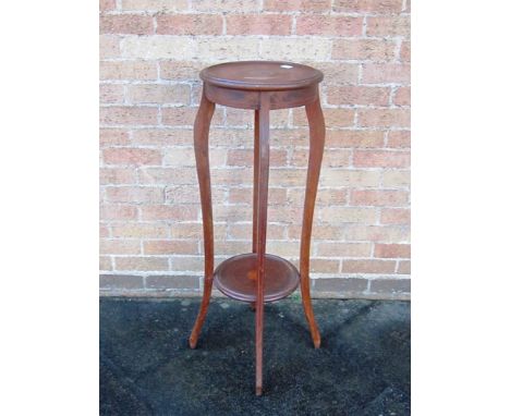 AN EDWARDIAN INLAID MAHOGANY JARDINIERE STAND the four cabriole supports joined by under shelf, 100cm high