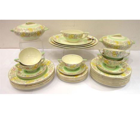 A WEDGWOOD & CO ART DECO DINNER SERVICE comprising seven side plates, five soup bowls & six soup saucers, ten breakfast plate
