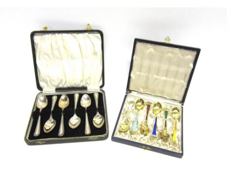 A CASED SET OF SIX SILVER TEASPOONS by Edward Viner, Sheffield 1931, bead pattern, 80g gross; with a cased set of six gilt an