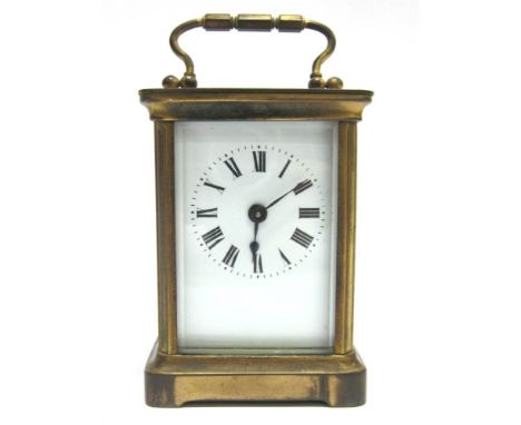 A FRENCH BRASS CASED CARRIAGE CLOCK the enamel dial with Roman numerals, the back plated stamped 'R.&Co., Made in Paris', 11c