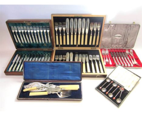 A CASED SET OF FISH KNIVES AND FORKS the twenty four pieces with silver ferrules, Sheffield 1915, and ivory handles; with a c