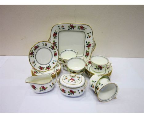 A WEDGWOOD 'CHINESE FLOWERS' PART TEA SET comprising seven teacups, five tea saucers, six tea plates, a cake plate, a cream j