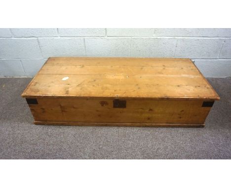 A long pine blanket chest, 31cm high, 136cm long; together with a Victorian faded beech framed nursing chair, with a bobbin t