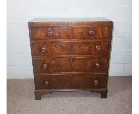 A Victorian mahogany chest of drawers, circa 1840, with two short and three long drawers, on bracket feet, 98cm high, 90cm wi