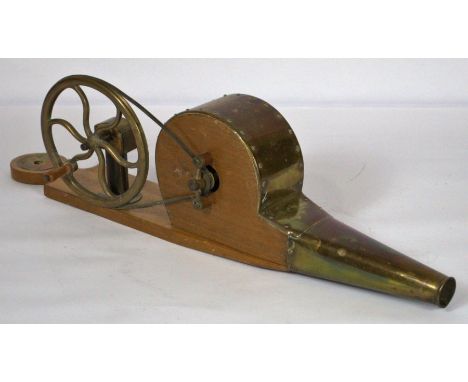 A vintage brass hand wound bellows, on wooden base, 60cm long; together with a small oak pipe rack and a small wooden spoon b