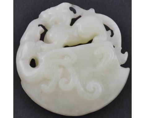 A Chinese carved jade pendant. 