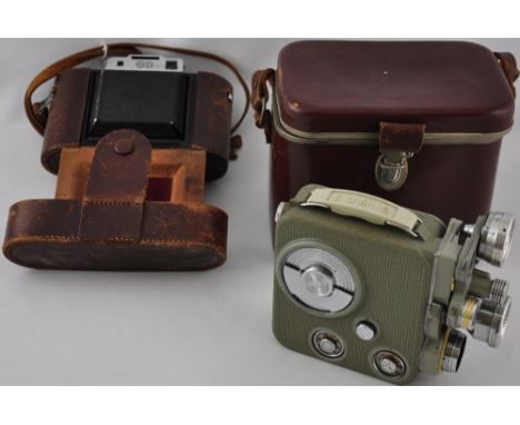 An Austrian Eumig cine camera circa 1960, cased, together with a vintage Agifold belows camera 