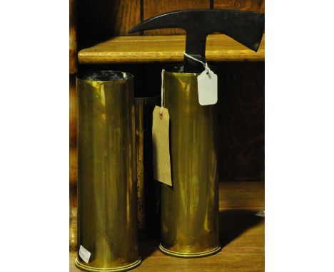 Three First World War brass shell cases together with a vintage Chillington fireman's axe

