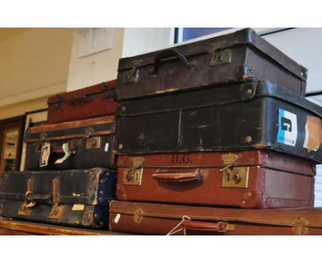 Seven assorted vintage cases and suitcases