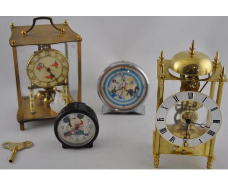 A Disney characters alarm clock, the dial including Buggs Bunny and Sylvester and set out with Arabic numerals at the quarter