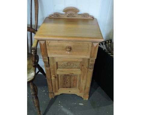 A pair of Victorian style pine bedside cabinets, each fitted drawer over panel covered base