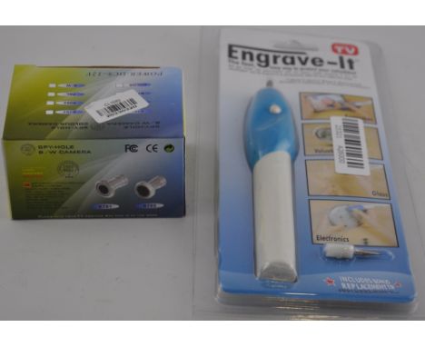a spy hole camera, together with an electric engraving tool, both new in boxes