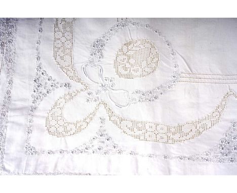 An uncommonly fine Belle Epoque pillow sham and sheet set, each element embroidered with a cursive monogram, and the family i